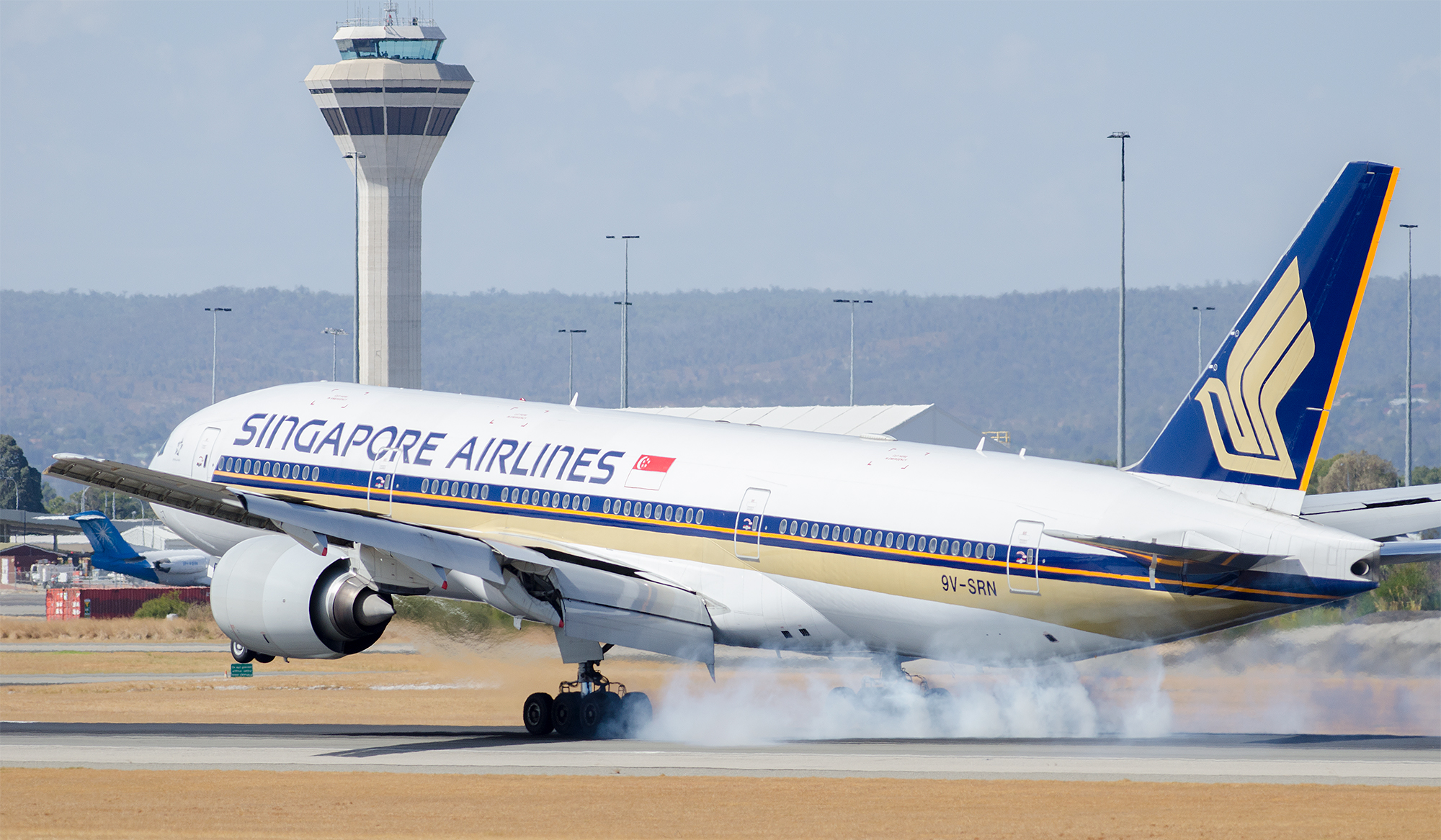 Where there's smoke, there's a 777 grabbing onto the earth with all 12 tires...